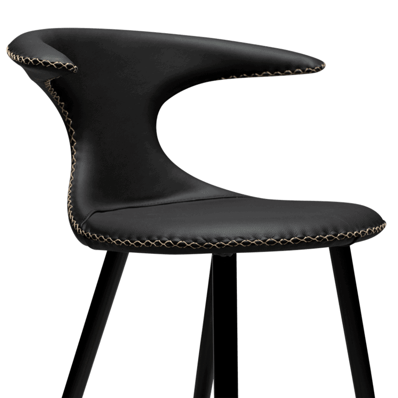 black leather chair and stool